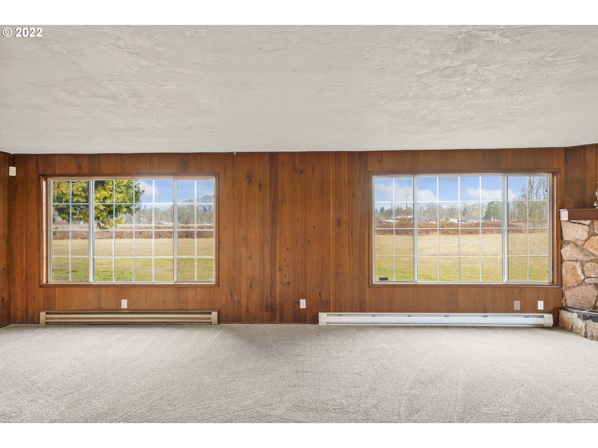84926 Cloverdale Road Creswell, OR 97426 - Photo 7 of 31 a view of an empty room with a window