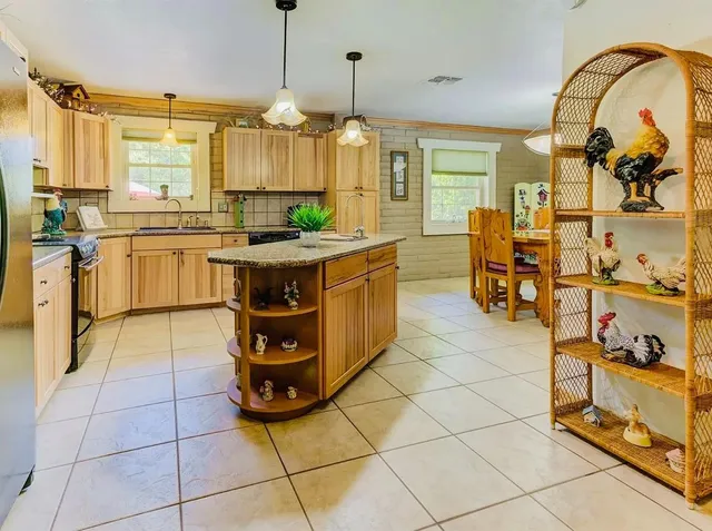 a kitchen with a cabinets and appliances