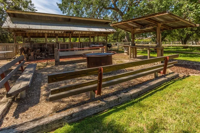 a house with trees in the background