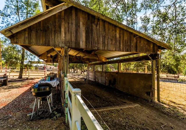 a view of street with sitting area