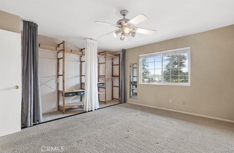 801 Yankee Point Way Oceanside, CA 92058 - Photo 9 of 14 Primary bedroom with closet organizer