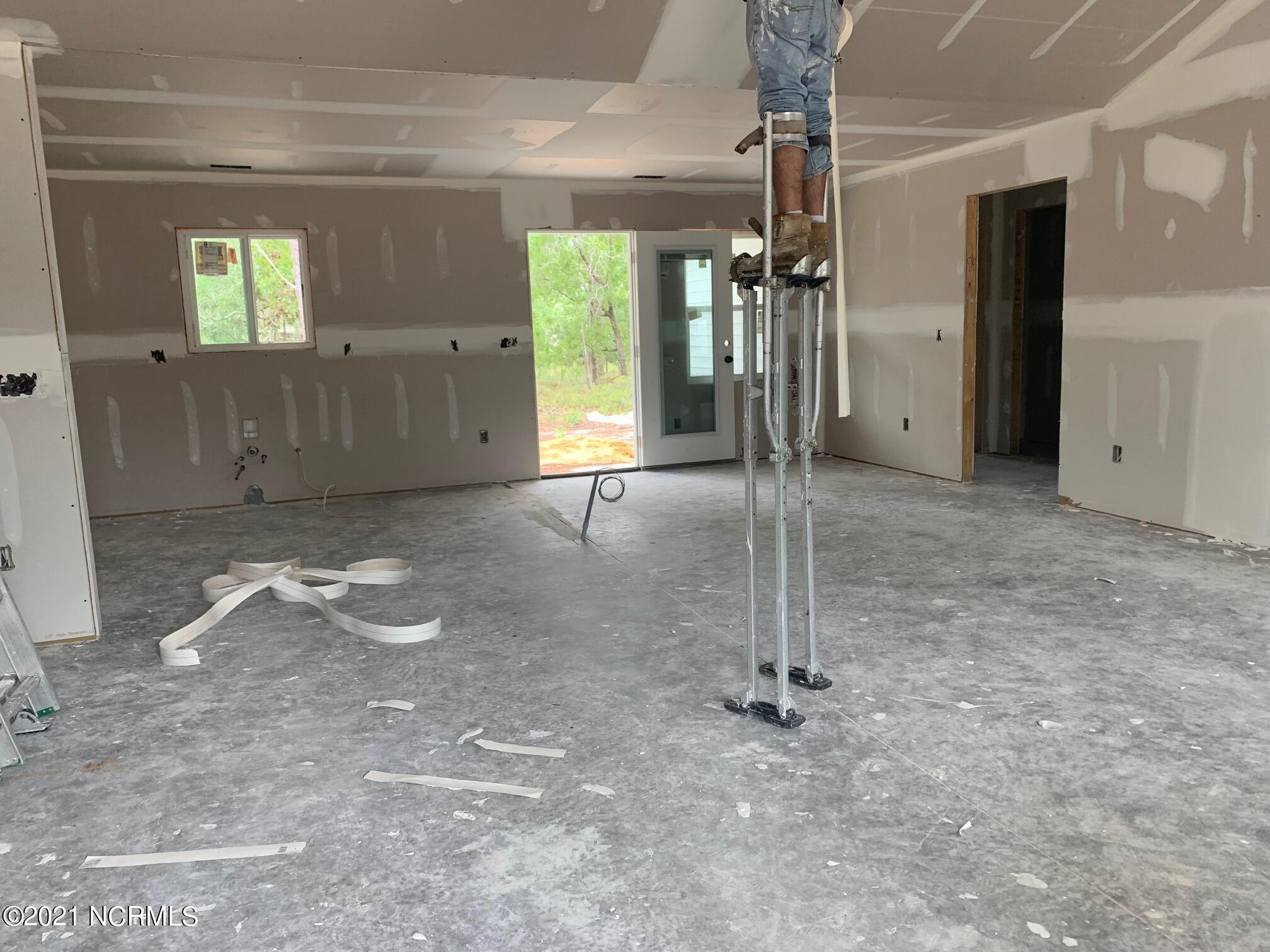 1055 Nicklaus Road Southport, NC 28461 - Photo 2 of 10 Kitchen / Great room