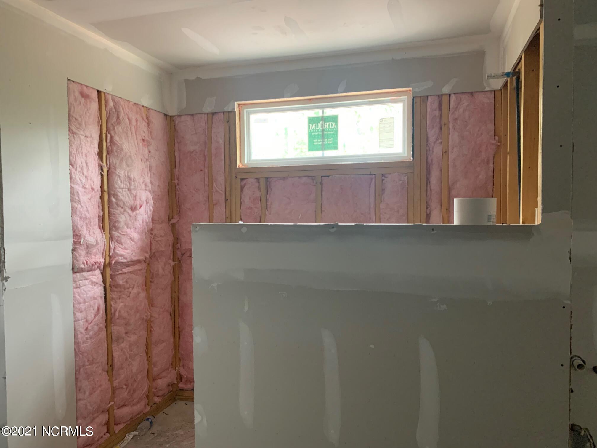 1055 Nicklaus Road Southport, NC 28461 - Photo 5 of 10 Owners bathroom