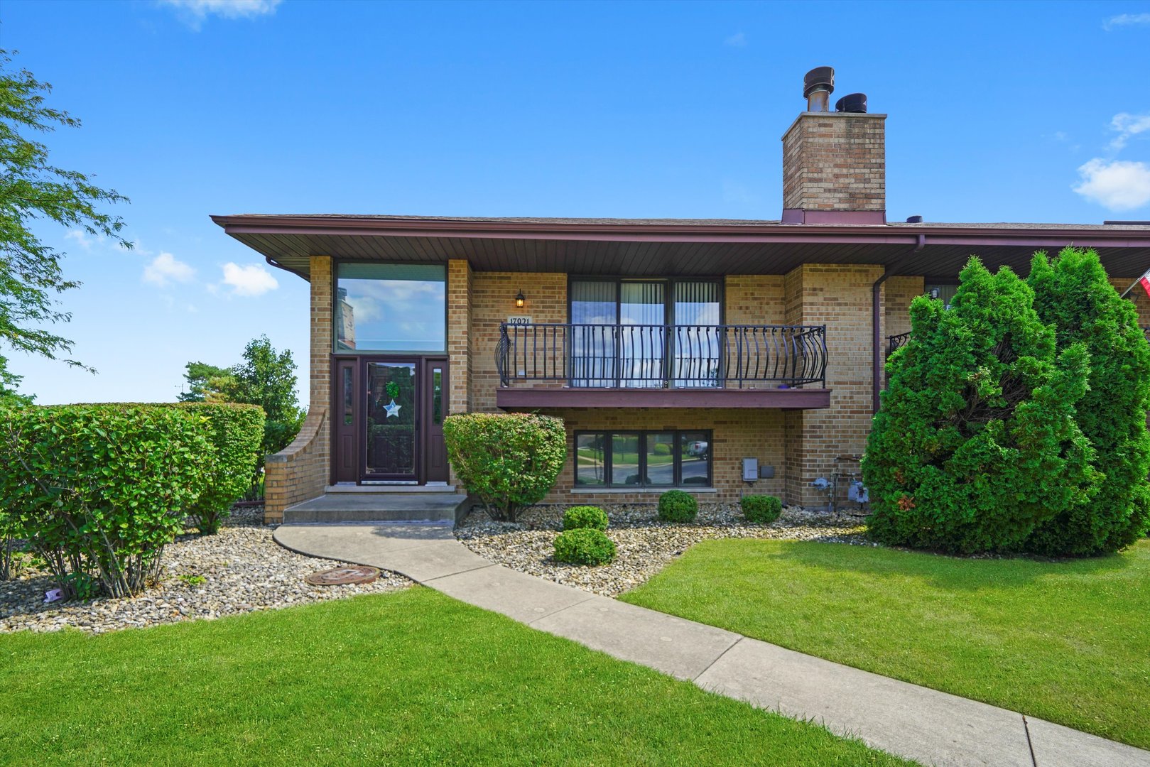 17921 Alaska Court, Unit 8 Orland Park, IL 60467 - Photo 1 of 36 front view of a house with a yard