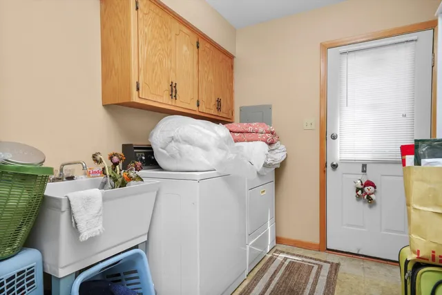 a storage room with washer and dryer