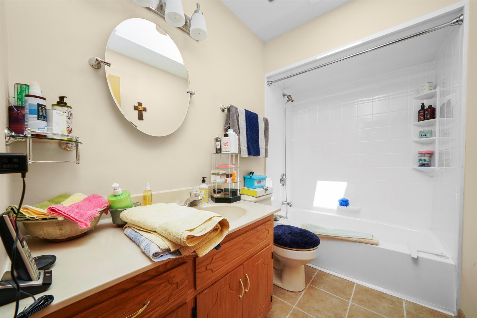 17921 Alaska Court, Unit 8 Orland Park, IL 60467 - Photo 16 of 36 a bathroom with a sink mirror toilet and vanity