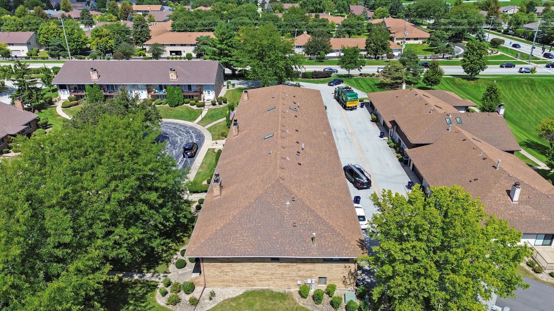 17921 Alaska Court, Unit 8 Orland Park, IL 60467 - Photo 23 of 36 an aerial view of multiple houses with yard