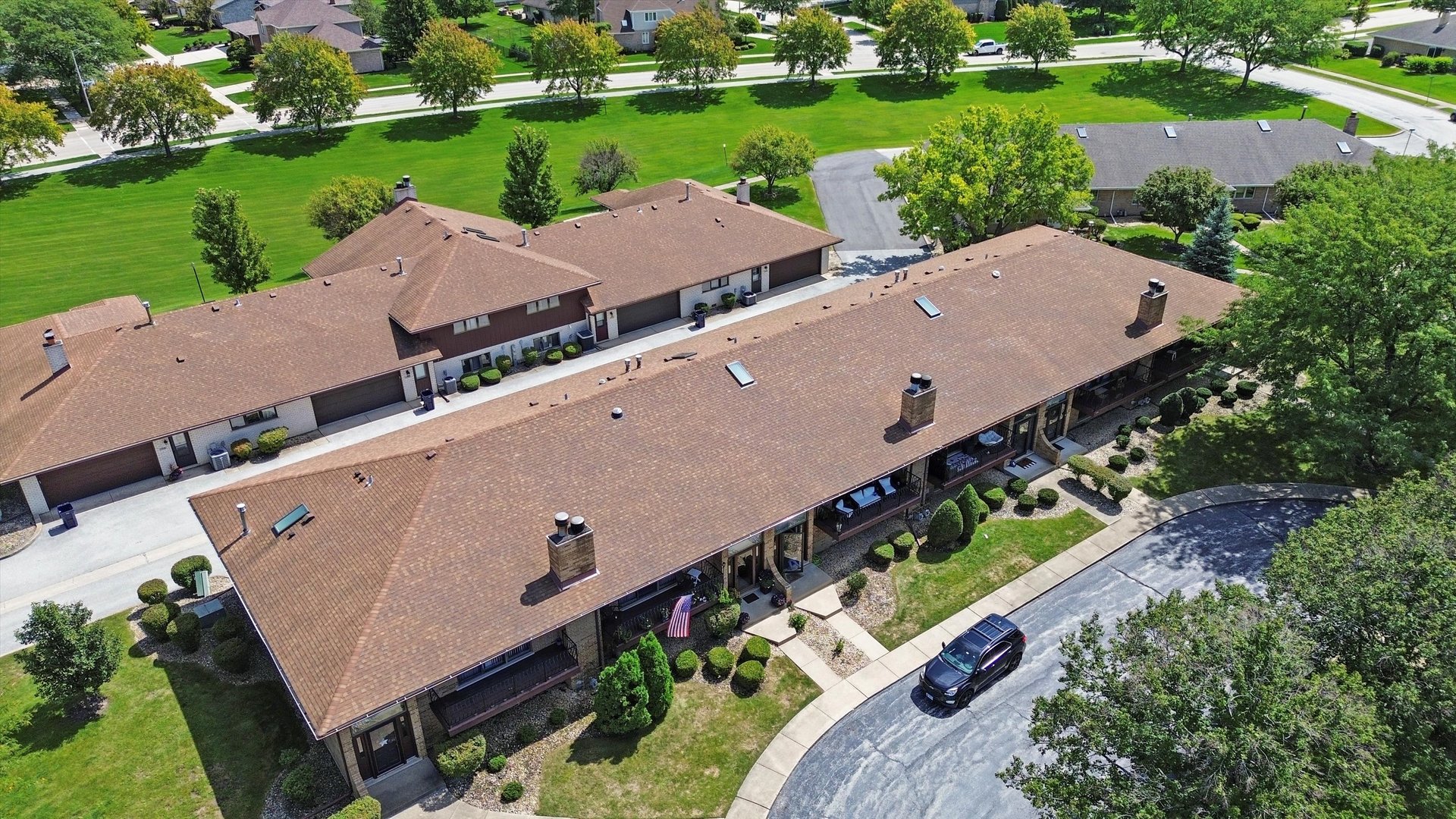 17921 Alaska Court, Unit 8 Orland Park, IL 60467 - Photo 25 of 36 an aerial view of a house with a garden