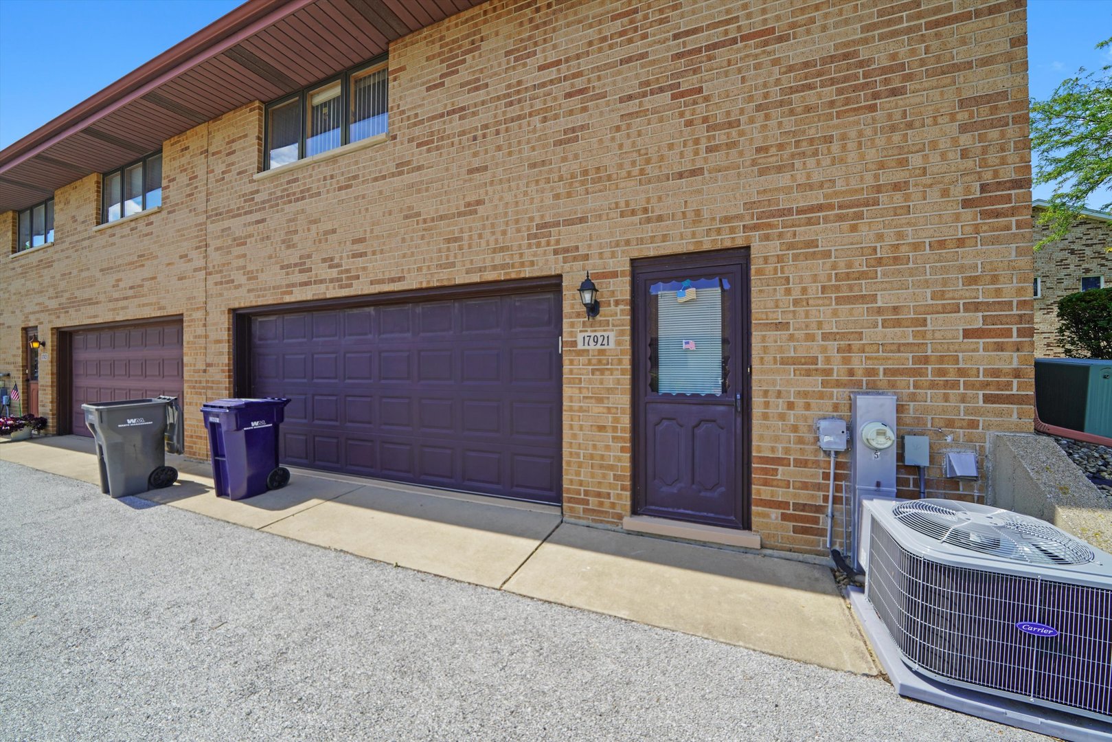 17921 Alaska Court, Unit 8 Orland Park, IL 60467 - Photo 30 of 36 a view of an outdoor space with brick wall and seating