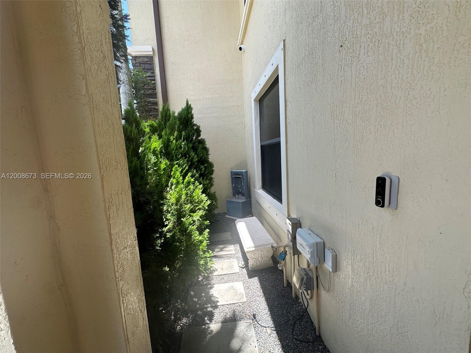 3211 Southeast 6th Street Homestead, FL 33033 - Photo 4 of 41 Sideways to the entrance