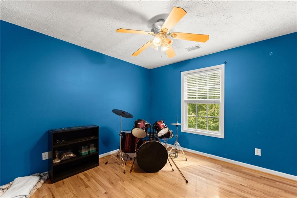 7540 County Line Road Lula, GA 30554 - Photo 29 of 64 a room with furniture and a window