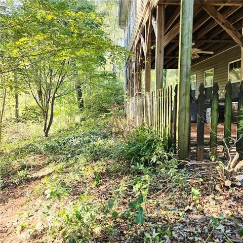 a view of a yard with a lake