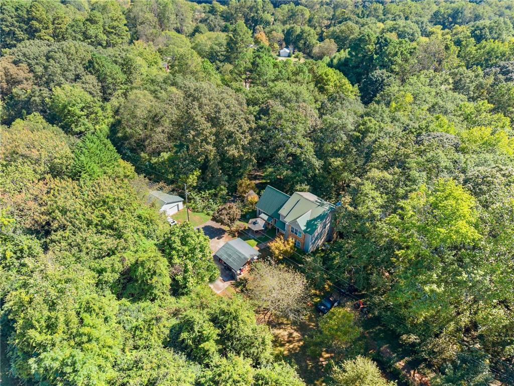 7540 County Line Road Lula, GA 30554 - Photo 53 of 64 an aerial view of residential house with outdoor space and trees all around
