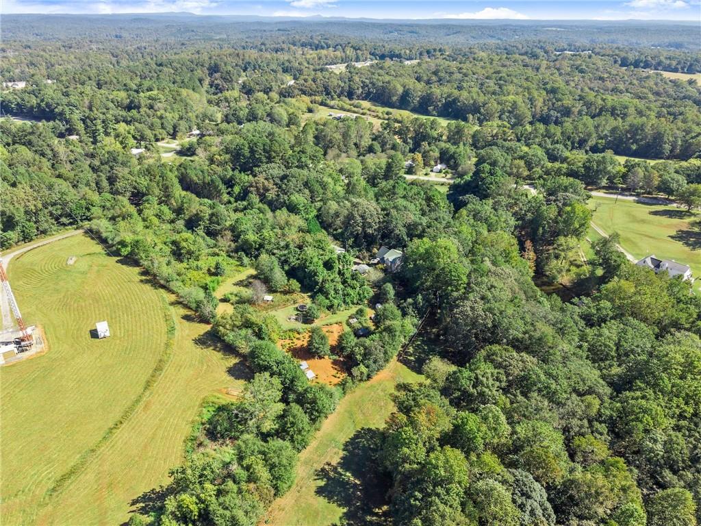 7540 County Line Road Lula, GA 30554 - Photo 62 of 64 an aerial view of a houses with a yard