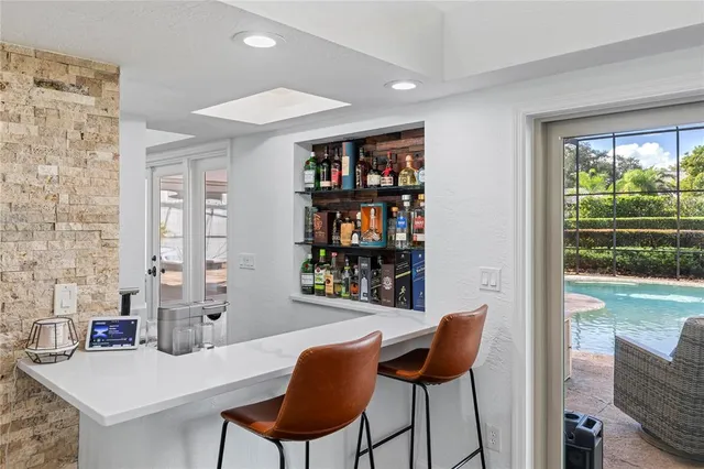 a view of a livingroom with furniture and window