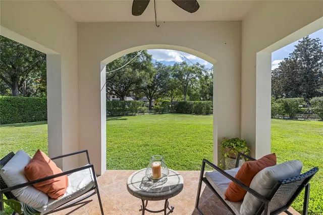 a view of a patio with a yard
