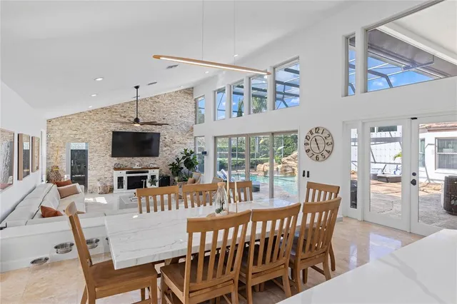 a view of a dining room with furniture window and outside view