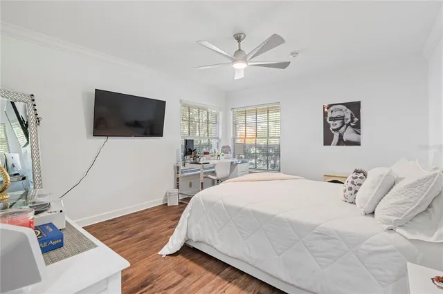 a bathroom with a sink double vanity and a toilet