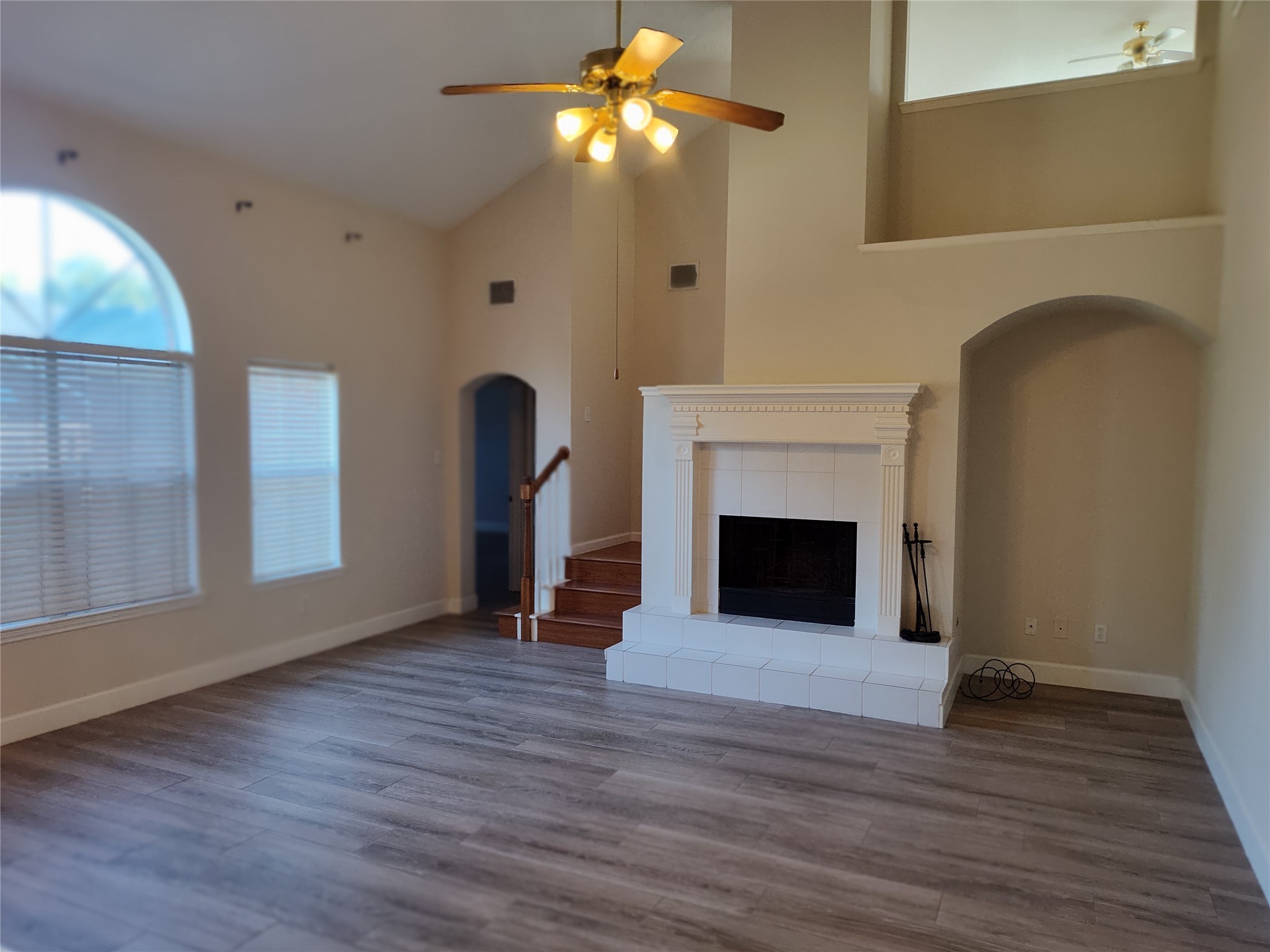 4127 North Nolan Place Pearland, TX 77584 - Photo 8 of 25 a view of a livingroom with a fireplace and window