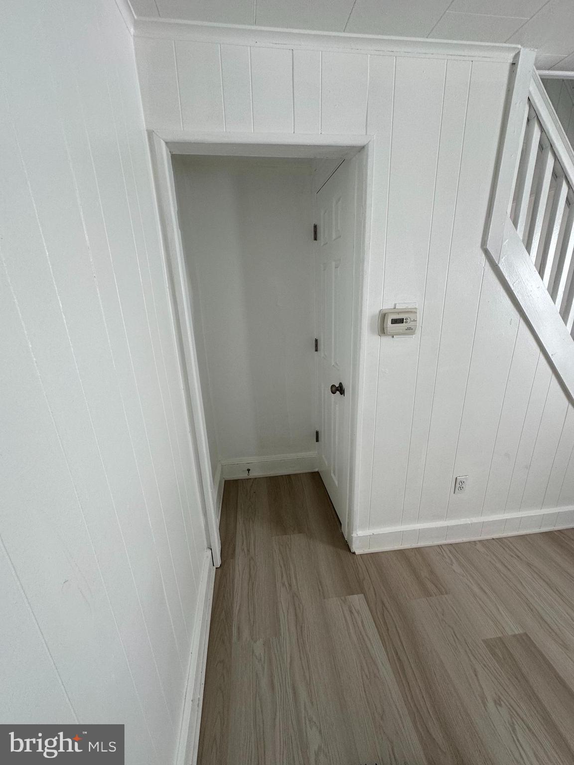 209 Main Street Hamilton, NJ 08620 - Photo 11 of 18 a view of a hallway with wooden floor