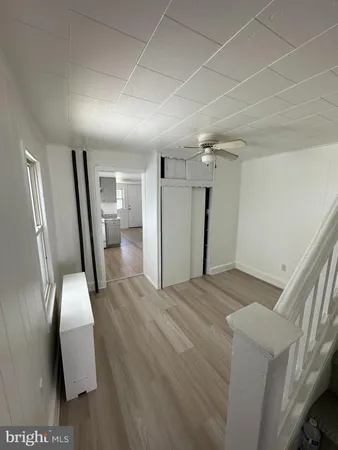 a view of entryway with wooden floor