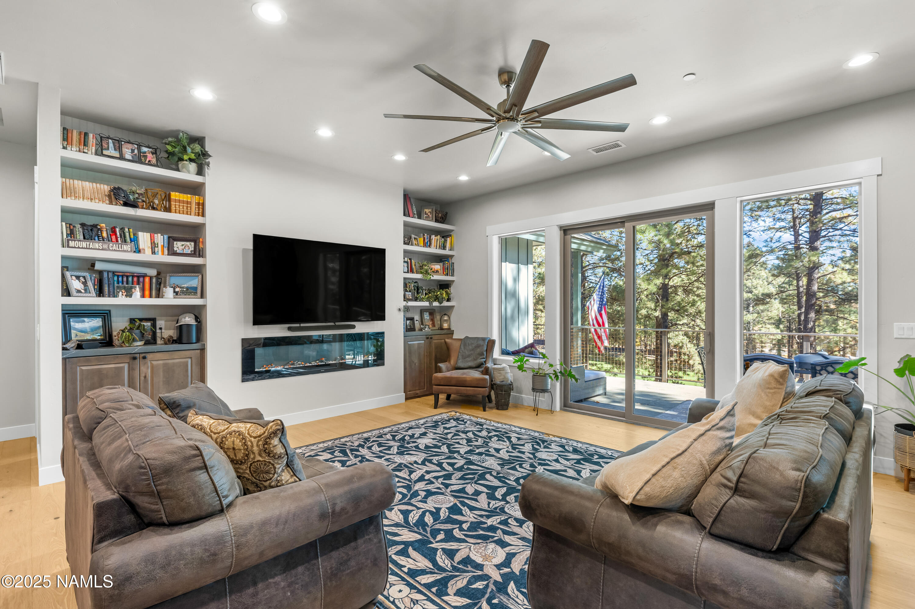 4180 Lariat Loop Flagstaff, AZ 86005 - Photo 12 of 59 a living room with furniture and a flat screen tv
