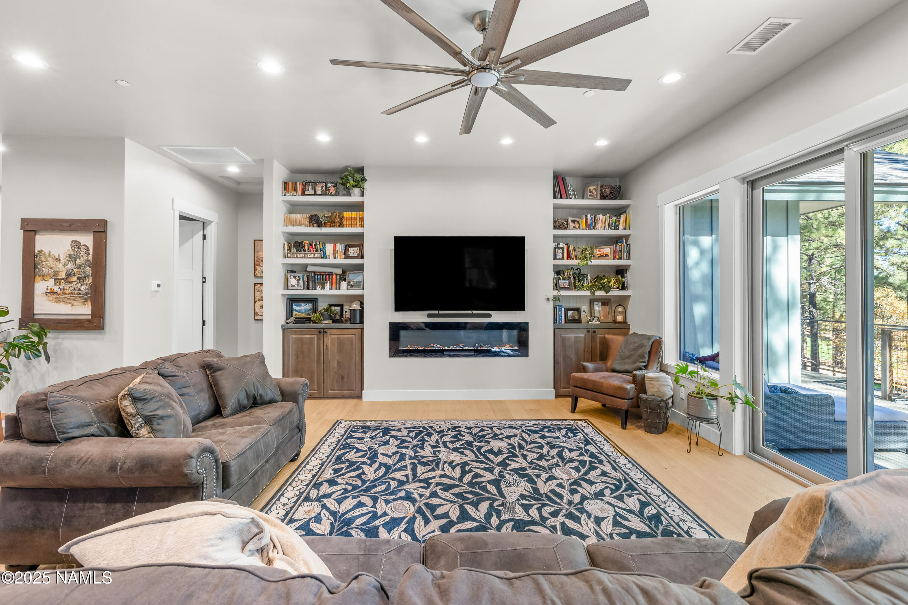 4180 Lariat Loop Flagstaff, AZ 86005 - Photo 13 of 59 a living room with furniture and a flat screen tv