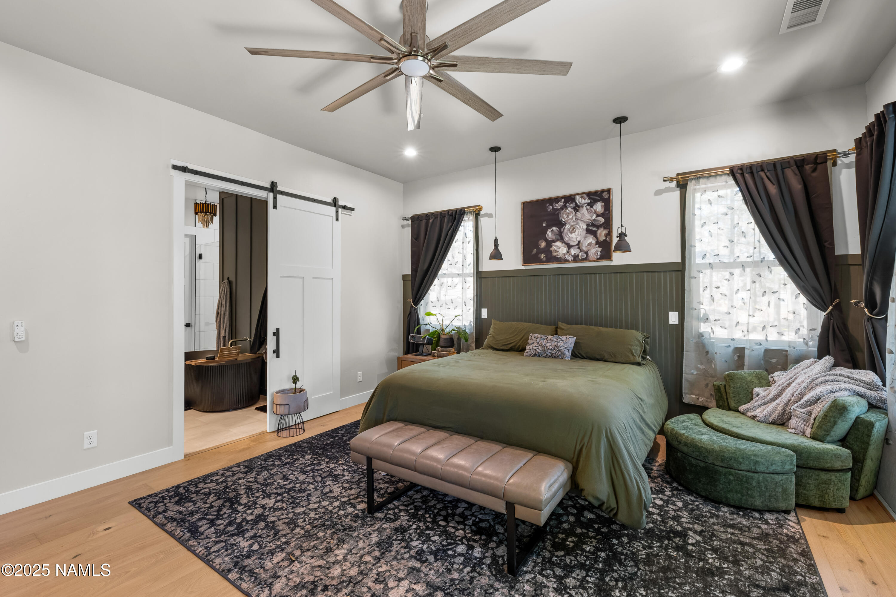 4180 Lariat Loop Flagstaff, AZ 86005 - Photo 24 of 59 a bedroom with a bed couch and a window