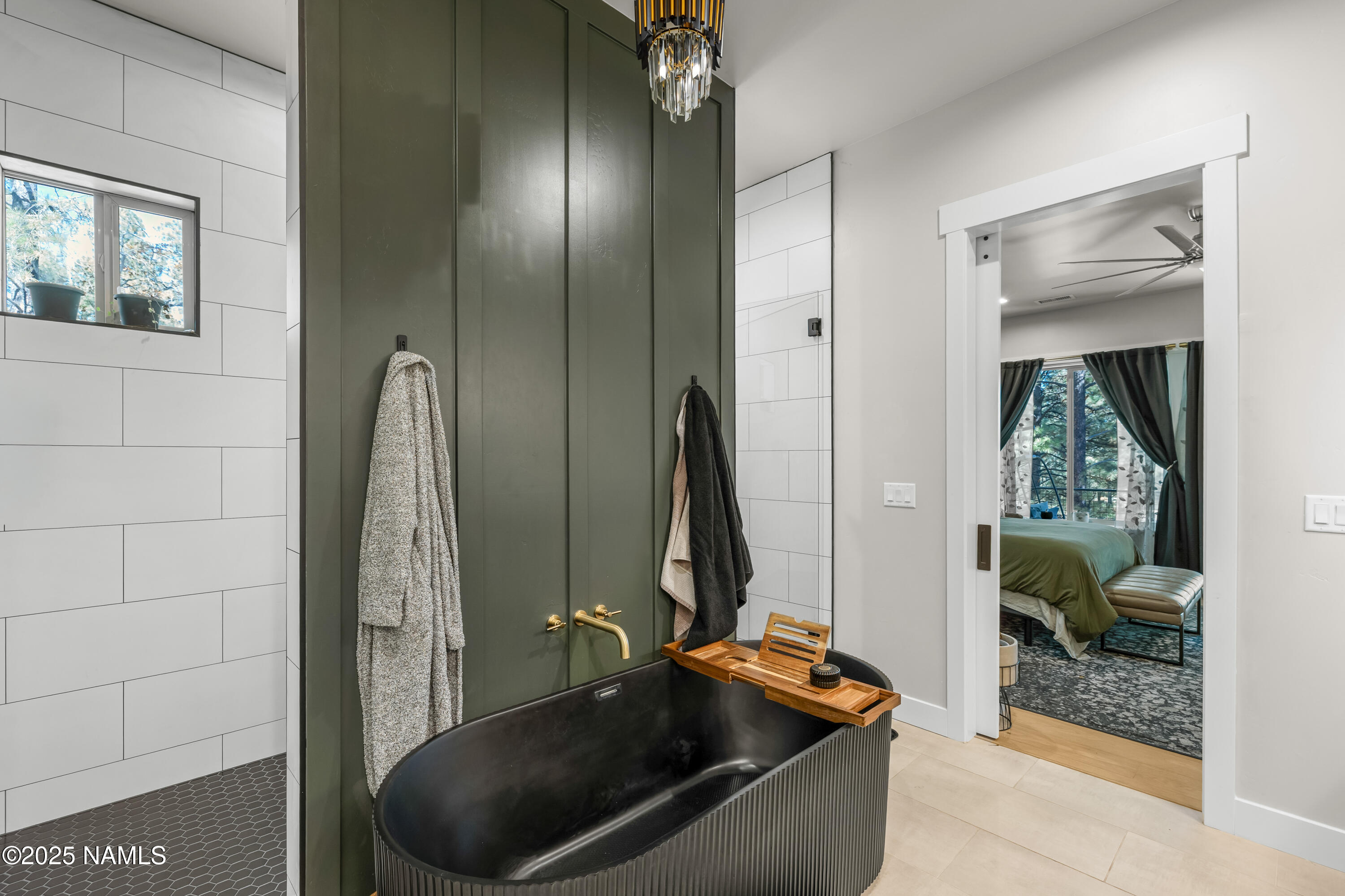4180 Lariat Loop Flagstaff, AZ 86005 - Photo 28 of 59 a bathroom with a sink and a mirror