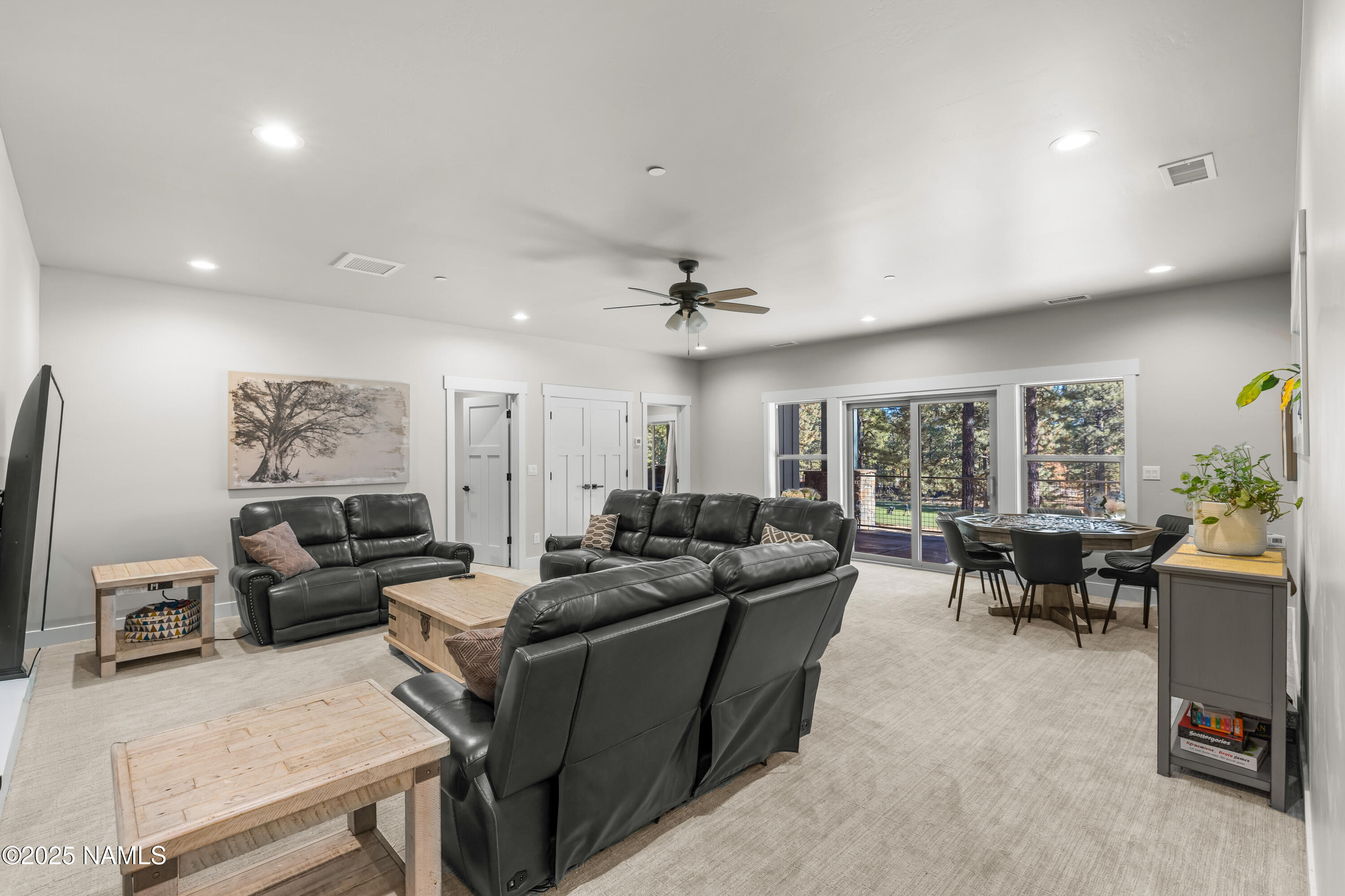 4180 Lariat Loop Flagstaff, AZ 86005 - Photo 30 of 59 a living room with furniture and a large window