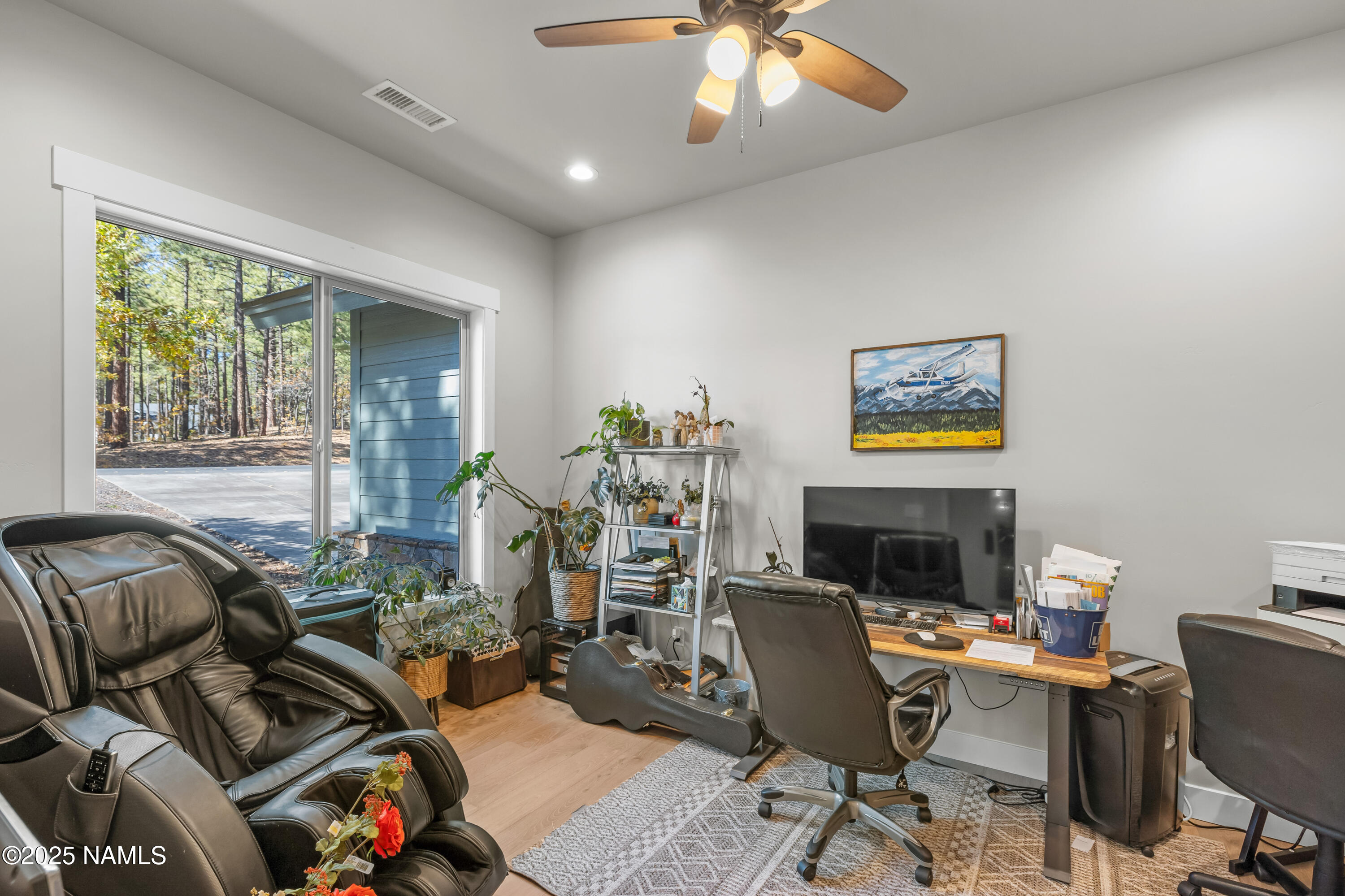 4180 Lariat Loop Flagstaff, AZ 86005 - Photo 4 of 59 a view of a workspace with furniture and a window