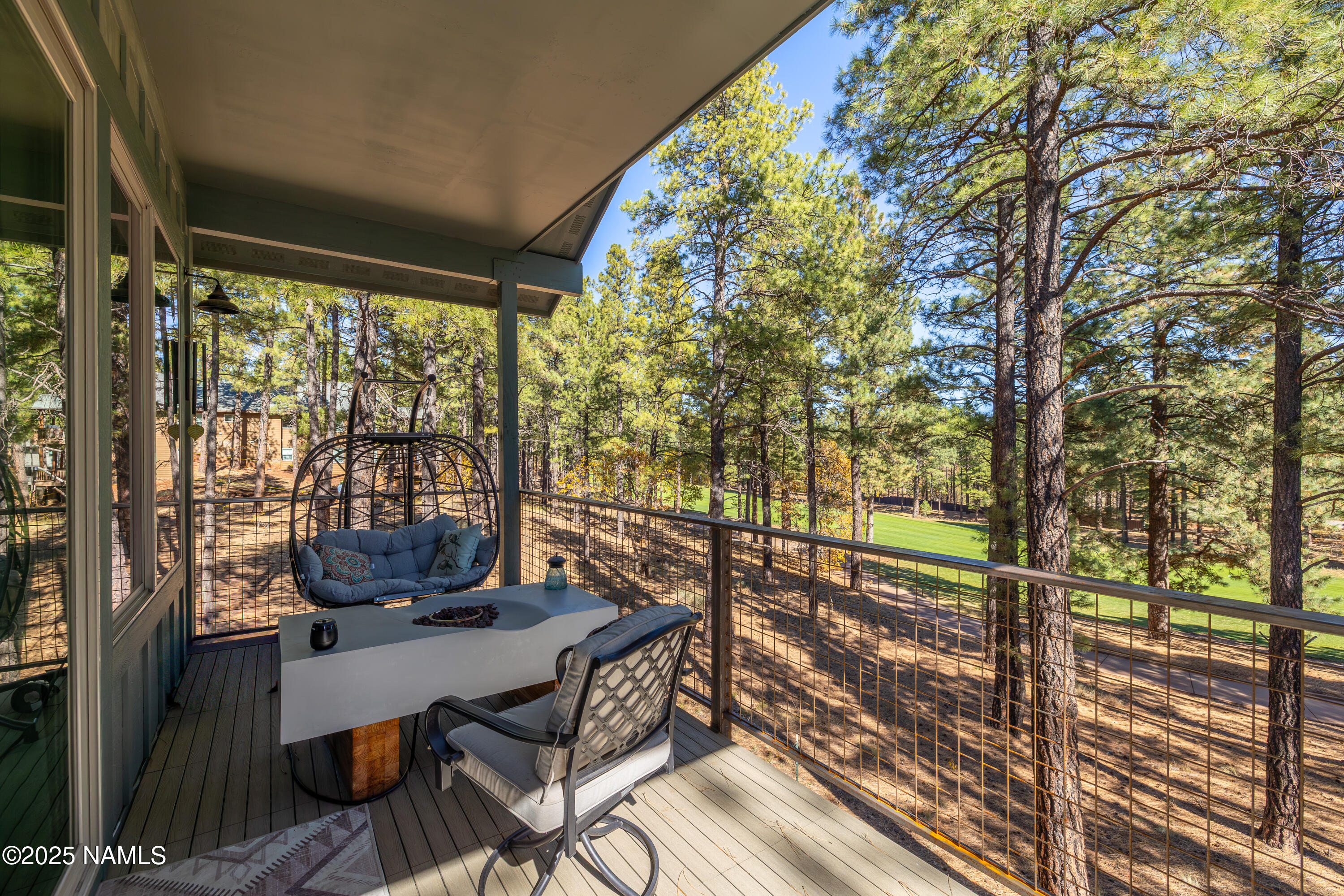 4180 Lariat Loop Flagstaff, AZ 86005 - Photo 50 of 59 a view of a chairs and table in the balcony