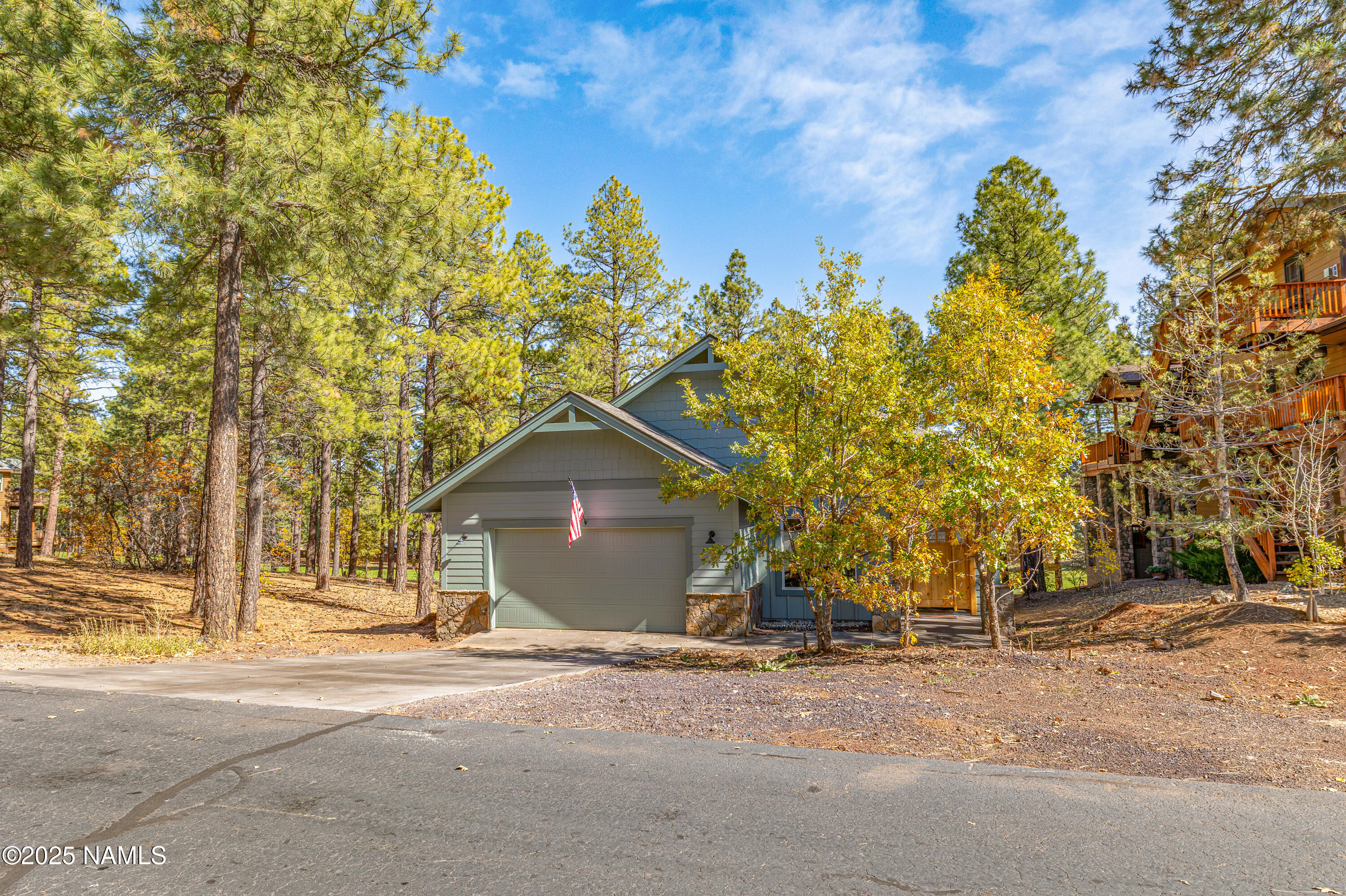 4180 Lariat Loop Flagstaff, AZ 86005 - Photo 59 of 59 a view of a house with a yard