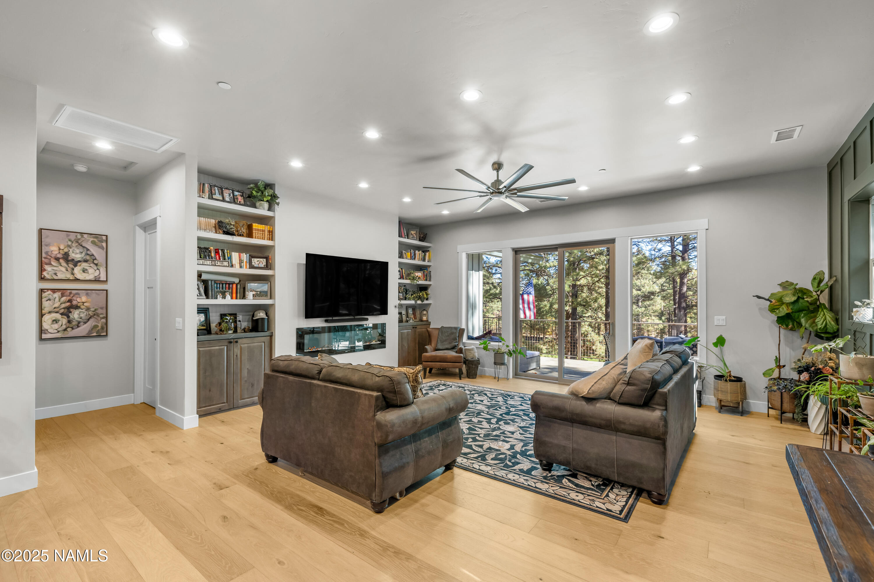 4180 Lariat Loop Flagstaff, AZ 86005 - Photo 9 of 59 a living room with furniture and a flat screen tv