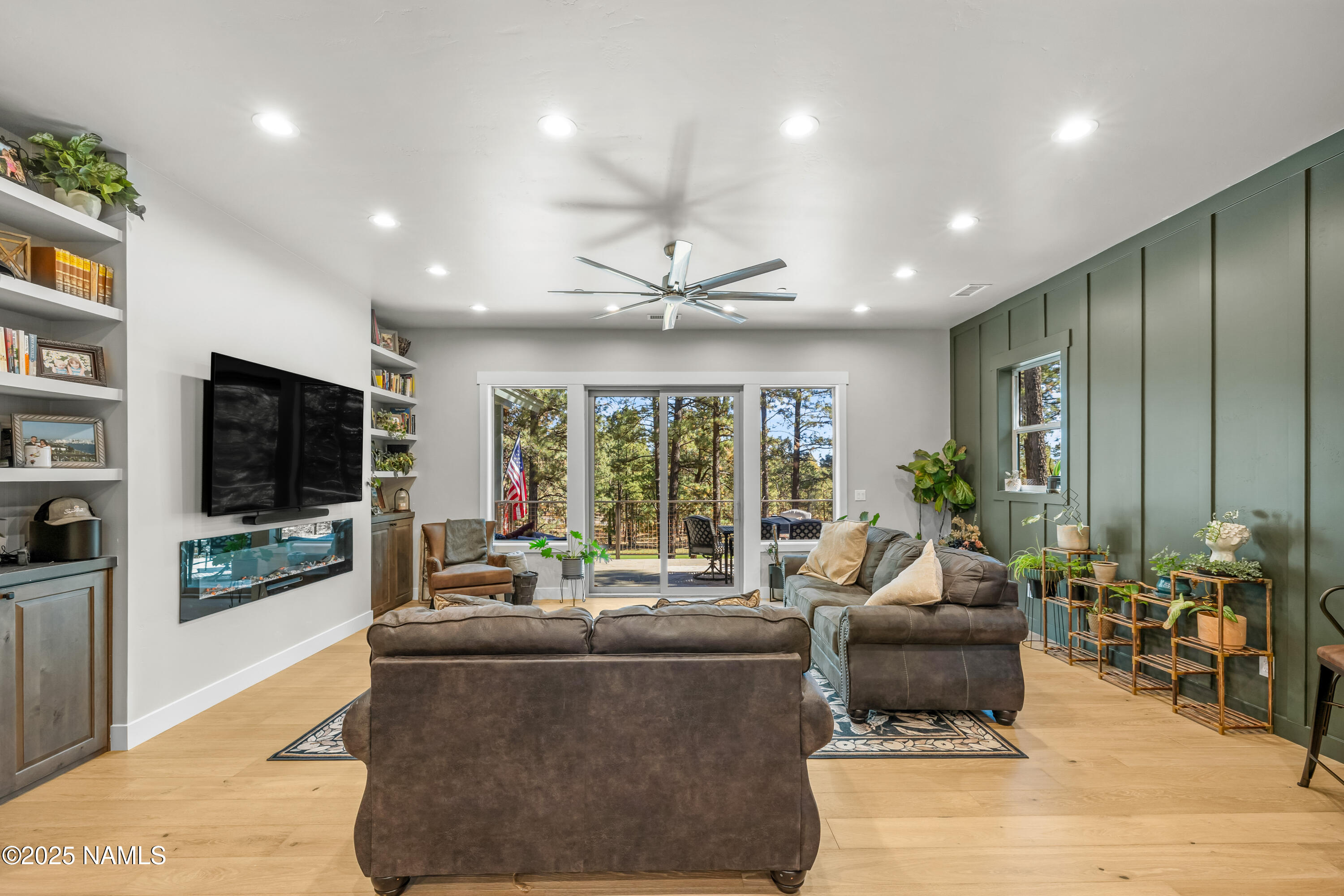 4180 Lariat Loop Flagstaff, AZ 86005 - Photo 10 of 59 a living room with furniture and a flat screen tv