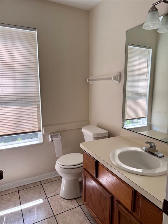 329 Northwest 48th Boulevard Gainesville, FL 32607 - Photo 7 of 7 a bathroom with a sink and a toilet