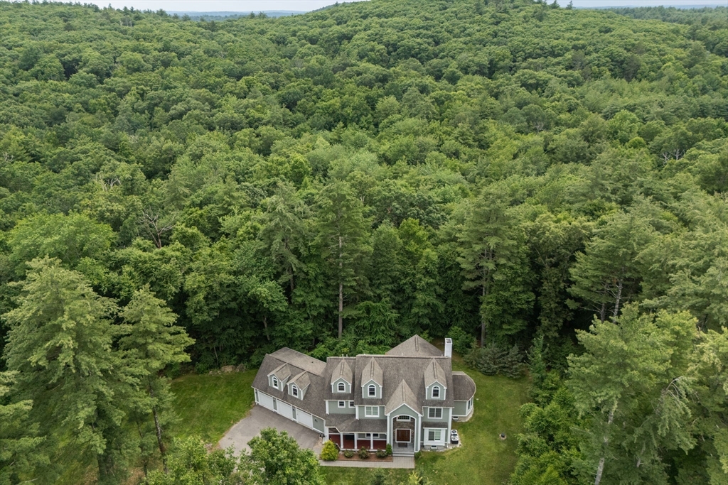 24 Wayside Inn Road Framingham, MA 01701 - Photo 38 of 38 an aerial view of a house with a yard