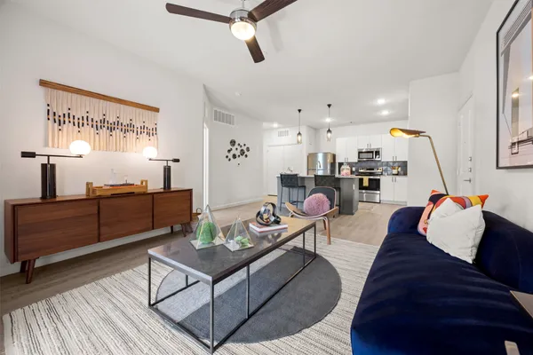 a living room with furniture and a window
