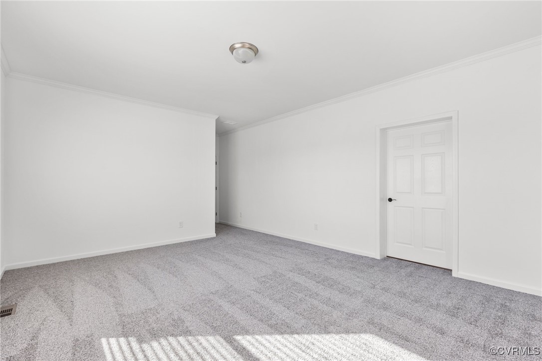 1151 Levi Road Green Bay, VA 23942 - Photo 31 of 38 Empty room featuring baseboards, carpet floors, an