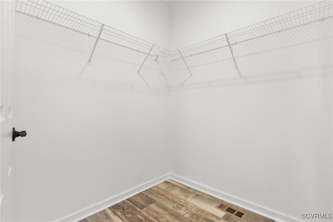 1151 Levi Road Green Bay, VA 23942 - Photo 35 of 38 Spacious closet featuring visible vents and wood f