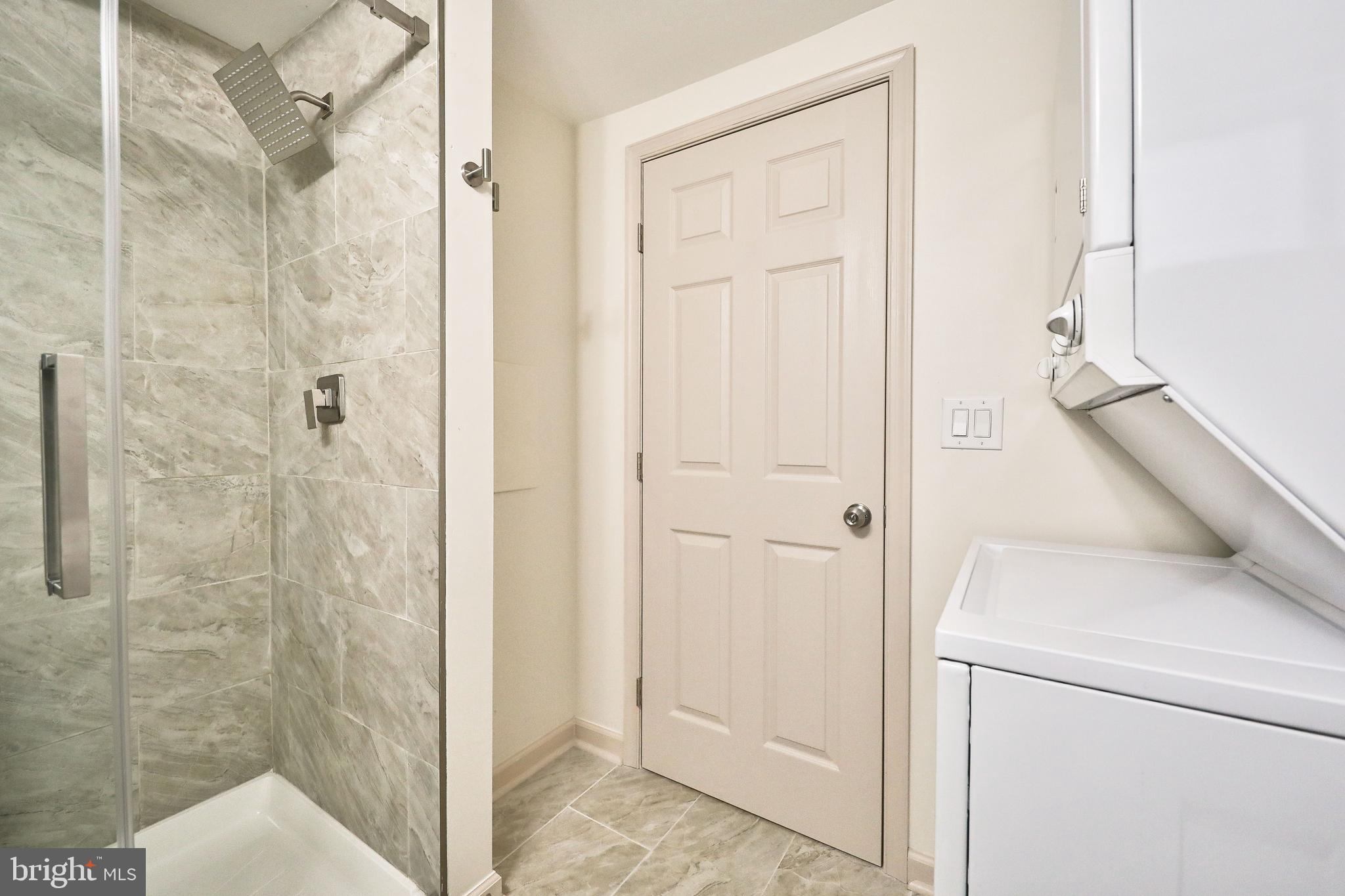314 Huntingdon Pike, Unit 314A Jenkintown, PA 19046 - Photo 9 of 14 a bathroom with a shower and a sink