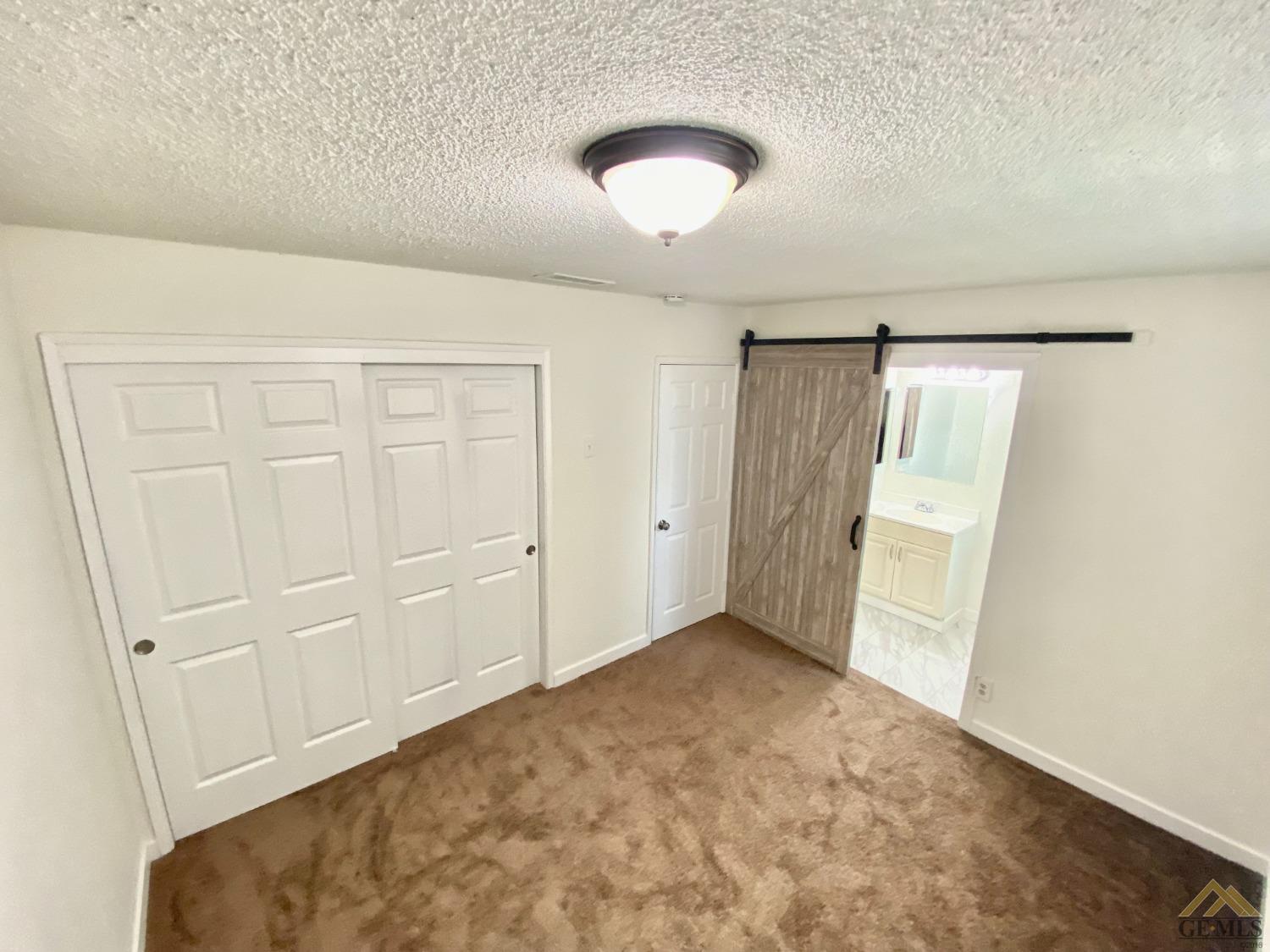 Undisclosed Address Wasco, CA 93280 - Photo 4 of 10 a view of an empty room