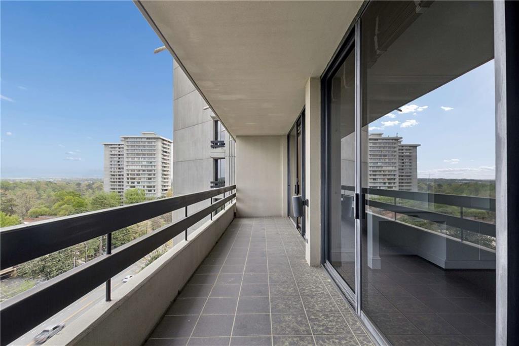 2660 Peachtree Road Northwest, Unit 13F Atlanta, GA 30305 - Photo 37 of 56 a view of balcony with couch