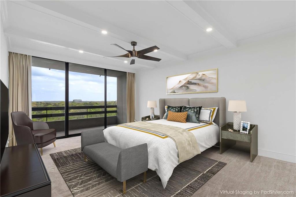 2660 Peachtree Road Northwest, Unit 13F Atlanta, GA 30305 - Photo 10 of 56 a bed room with a bed and a large window
