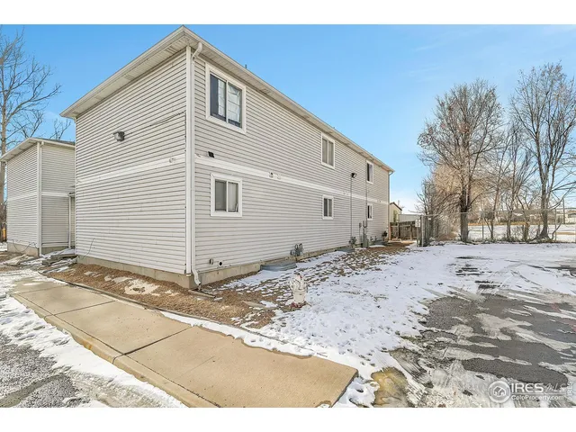 a view of a house with a snow