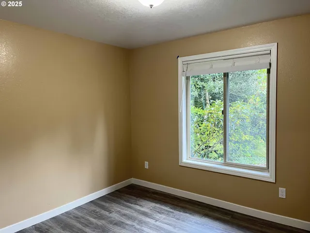 a view of a room that has a window in it