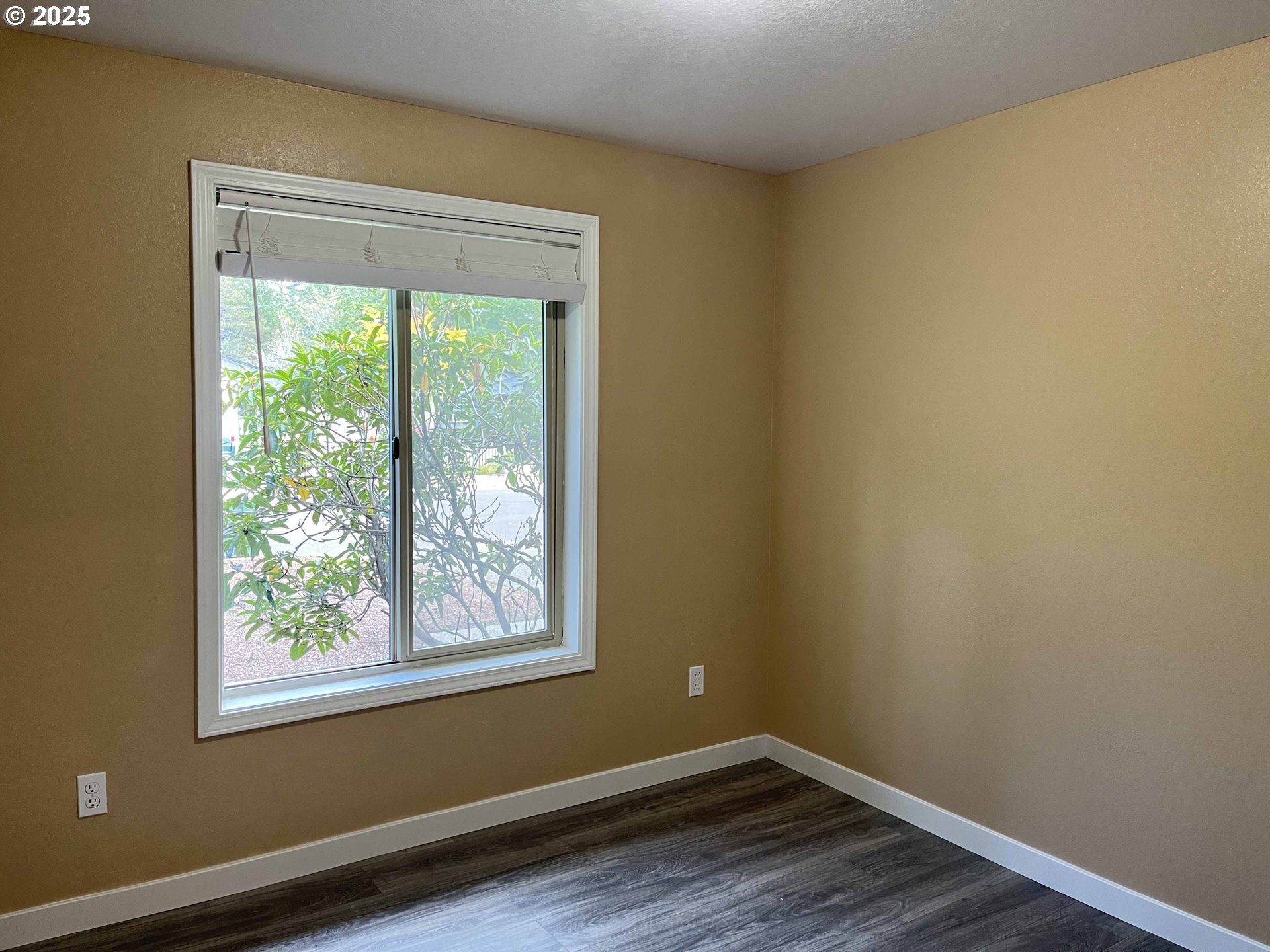 2040 11th Street Florence, OR 97439 - Photo 28 of 43 a view of a room that has a window in it
