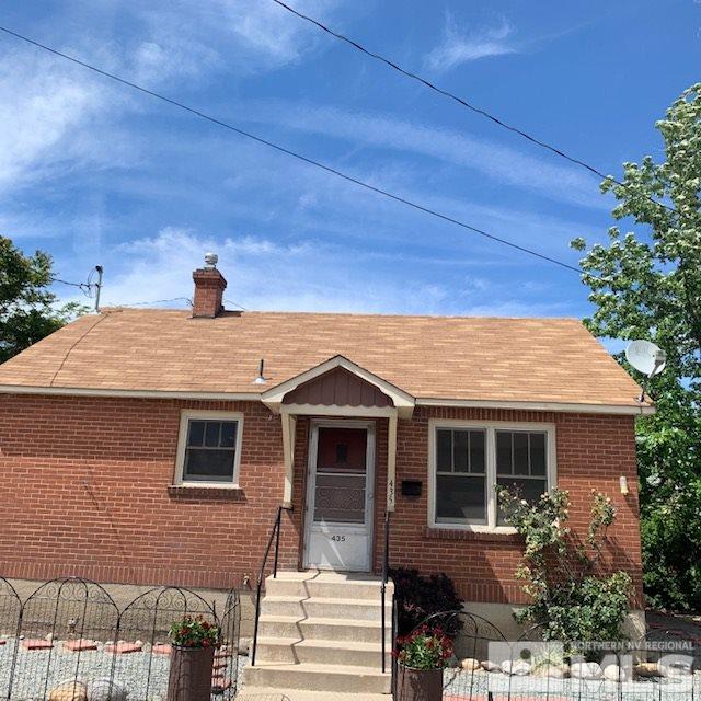 435 West Taylor Street Reno, NV 89509 - Photo 1 of 15 a front view of a house with a yard
