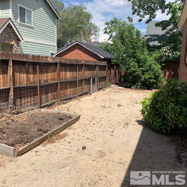 435 West Taylor Street Reno, NV 89509 - Photo 13 of 15 a front view of a house with a yard and garage