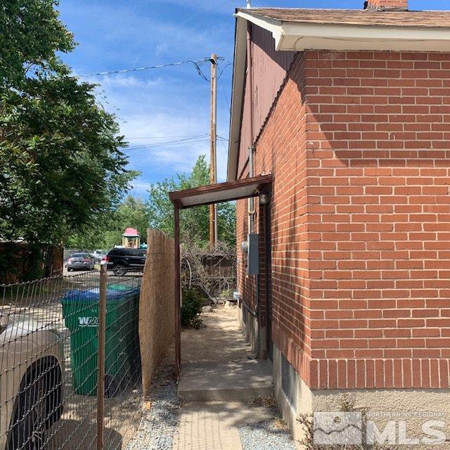 435 West Taylor Street Reno, NV 89509 - Photo 14 of 15 a view of a door with a chairs and table in a patio